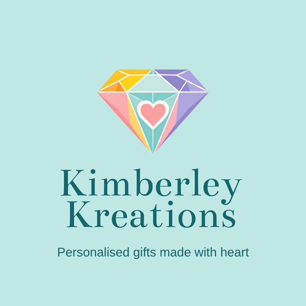 Kimberley Kreations logo: gemstone diamond with a pink heart