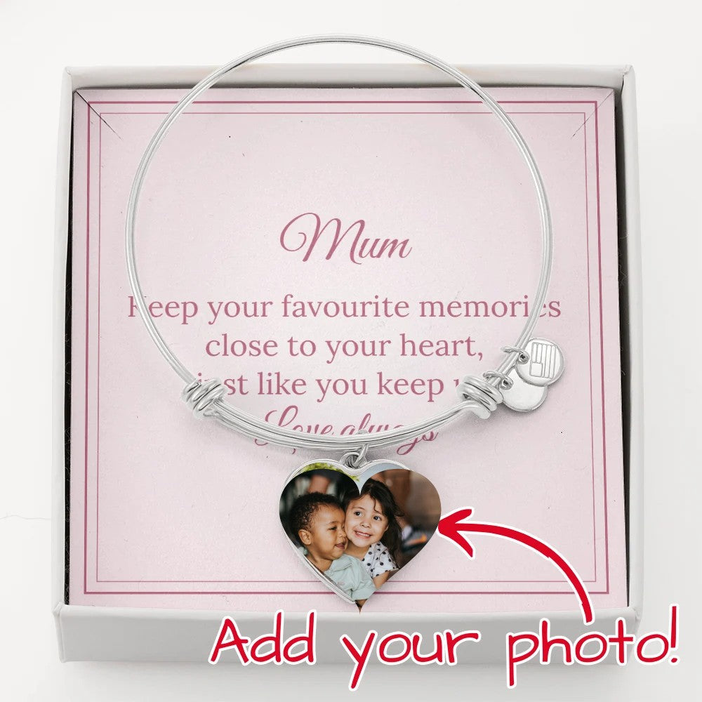 Photo Heart Bangle for Mum in silver, shown with a photo of children